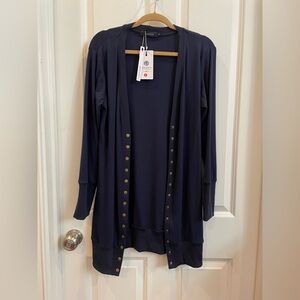 Navy blue long knit sweater gold buttons. Pair with western look.